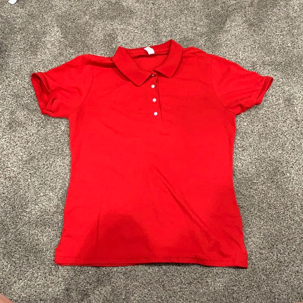 A red polo size large
